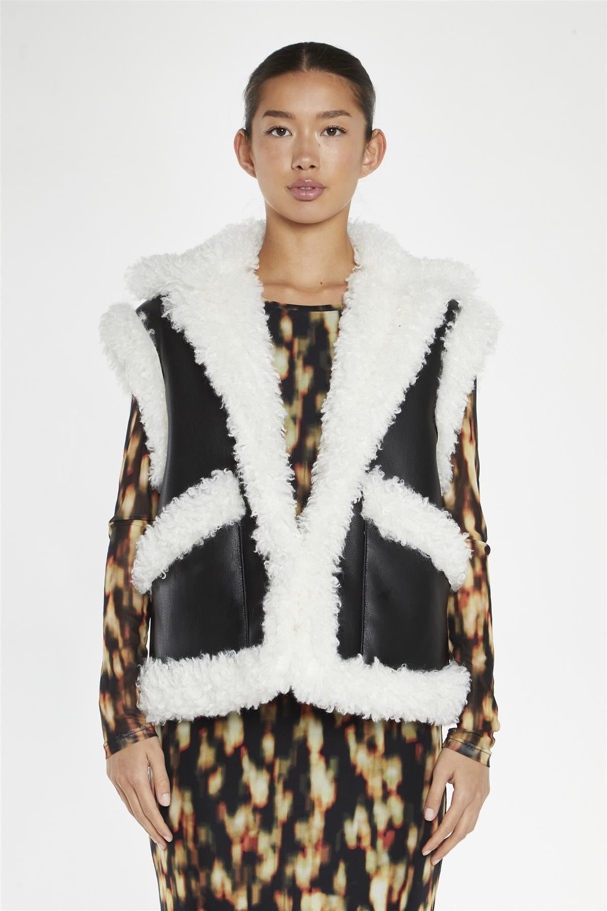 francespenny.shopblack-white-faux-shearling-trim-oversized-gilet_3.jpg